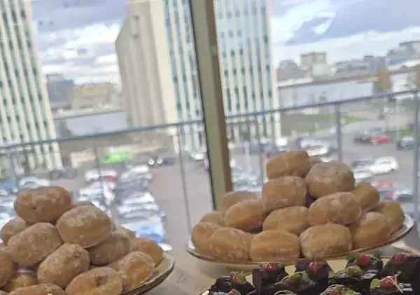 Dessert table with brownies, doughnuts and red velvet
