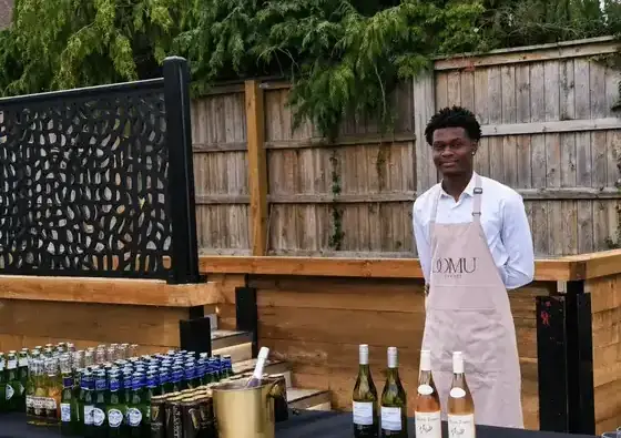 Domu bar team serving drinks to guests