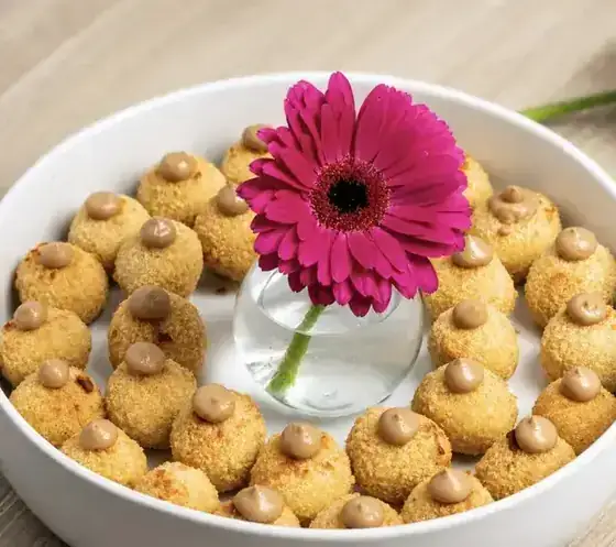 Arancini platter styled with fresh flower