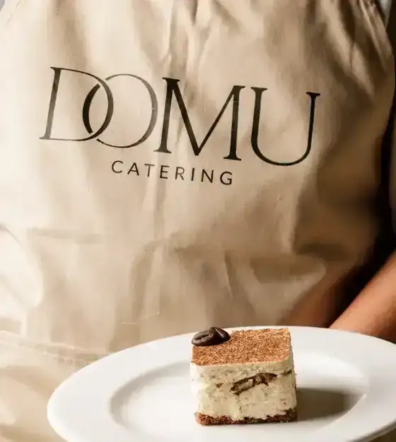 Tiramisu served by a Domu chef